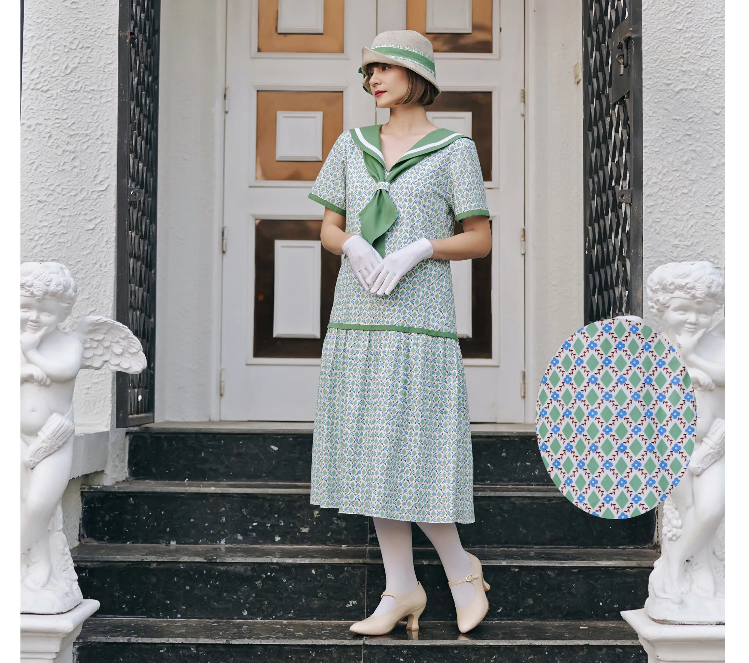 Cream cloche hat with green and white bow