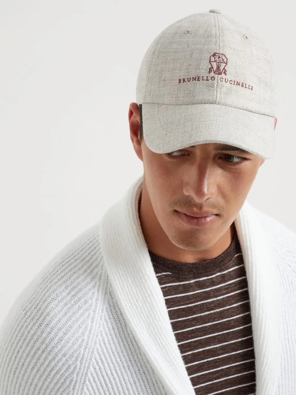 White Diagonal Baseball Cap with Embroidered Logo